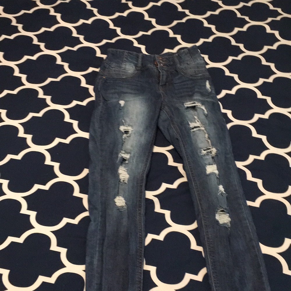 Size 3 distressed jeans, high waisted.